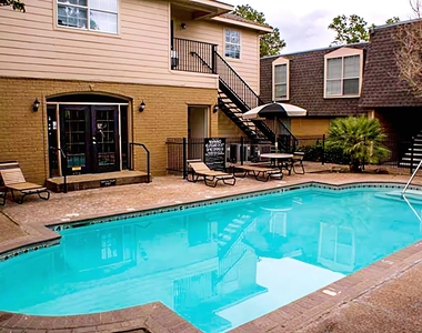 6311 Beverlyhill Street - Photo Thumbnail 2