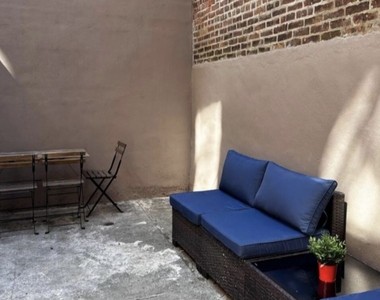 128 Greene Avenue - Photo Thumbnail 1