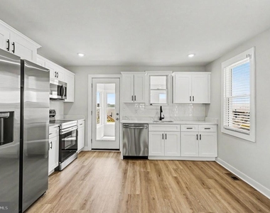 9135 Cuckold Point Road - Photo Thumbnail 2