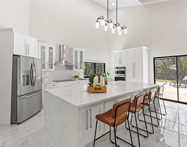 4520 Pine Hollow Drive - Photo Thumbnail 3