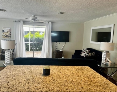 5742 Camelot Drive N - Photo Thumbnail 2