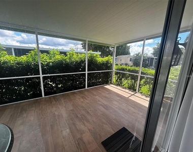 5742 Camelot Drive N - Photo Thumbnail 7