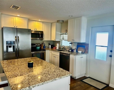 5742 Camelot Drive N - Photo Thumbnail 1