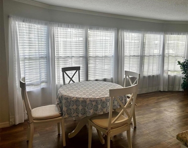 5742 Camelot Drive N - Photo Thumbnail 3