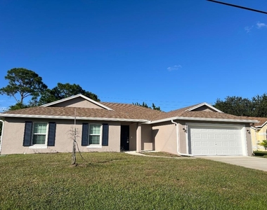 5951 Nw Baynard Drive - Photo Thumbnail 1