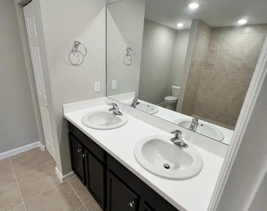 5951 Nw Baynard Drive - Photo Thumbnail 23