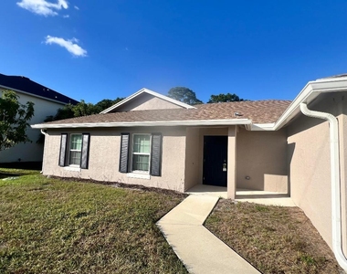 5951 Nw Baynard Drive - Photo Thumbnail 2