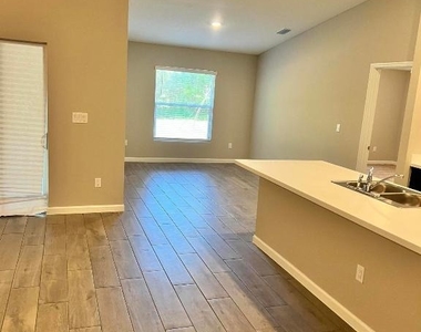 5951 Nw Baynard Drive - Photo Thumbnail 6