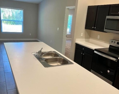 5951 Nw Baynard Drive - Photo Thumbnail 8