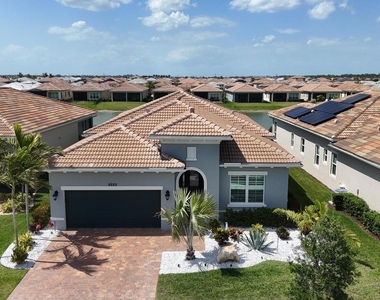 9282 Sw Miracoli Way - Photo Thumbnail 1