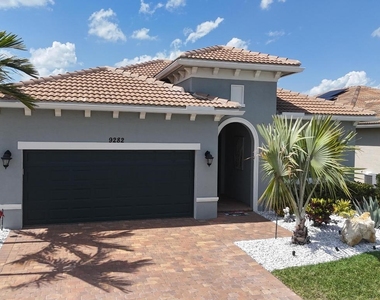 9282 Sw Miracoli Way - Photo Thumbnail 3