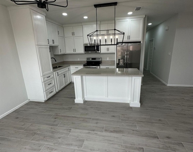 1409 S Xanthia Street - Photo Thumbnail 12