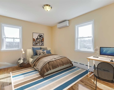 70-14 Olcott Street - Photo Thumbnail 2