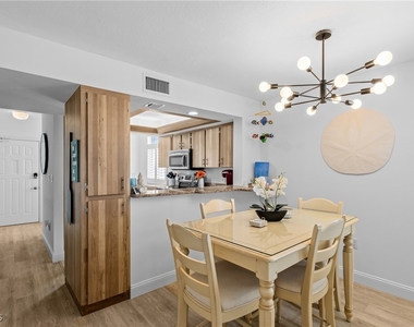 9415 Gulf Shore Drive - Photo Thumbnail 9