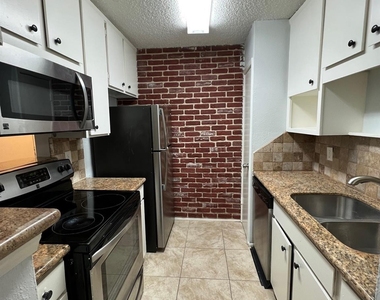 10047 Westpark Drive - Photo Thumbnail 14