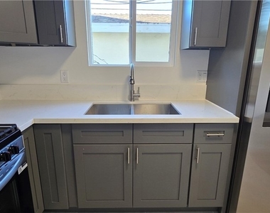 1428 E 54th - Photo Thumbnail 3