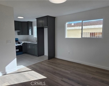 1428 E 54th - Photo Thumbnail 3
