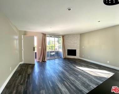 1529 S Bundy Drive - Photo Thumbnail 3