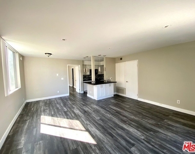 1529 S Bundy Drive - Photo Thumbnail 2