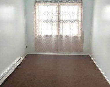 48-48 58th Place - Photo Thumbnail 5