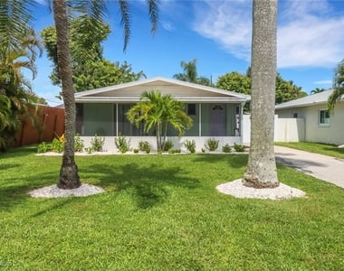 751 100th Avenue N - Photo Thumbnail 1