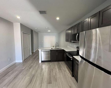 987 Nw 57th Court - Photo Thumbnail 2