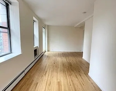 201 East 12th Street - Photo Thumbnail 3
