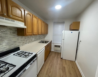 67-15 102nd Street - Photo Thumbnail 2