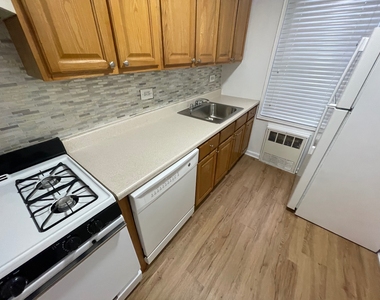67-15 102nd Street - Photo Thumbnail 3