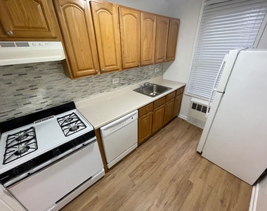 67-15 102nd Street - Photo Thumbnail 4