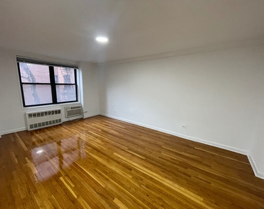 67-15 102nd Street - Photo Thumbnail 5