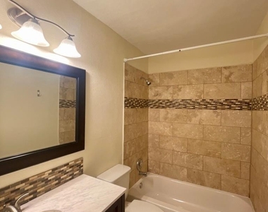 909 Reinli St - Photo Thumbnail 6