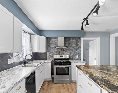 1051 Avenue A - Photo Thumbnail 1