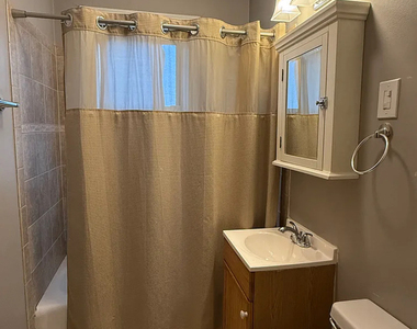 6010 W Seminole Street - Photo Thumbnail 7