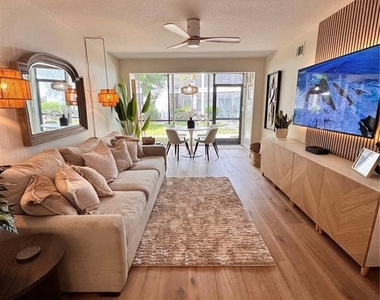 5623 Midnight Pass Road - Photo Thumbnail 4
