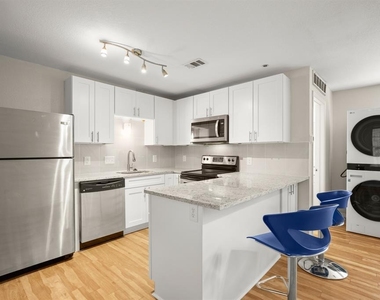 1013 W 23rd St - Photo Thumbnail 2
