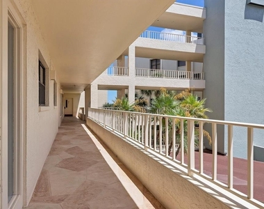 5740 Midnight Pass Road - Photo Thumbnail 4