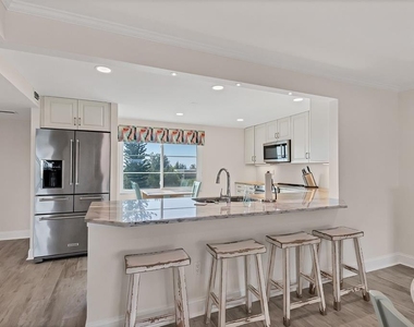 9397 Midnight Pass Road - Photo Thumbnail 10