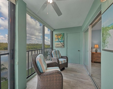 9397 Midnight Pass Road - Photo Thumbnail 4
