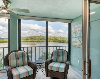 9397 Midnight Pass Road - Photo Thumbnail 9