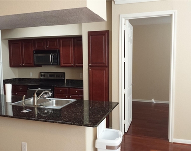 7575 Kirby Drive - Photo Thumbnail 2