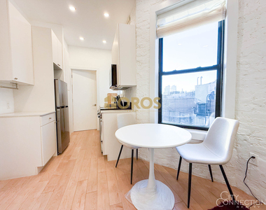 322 East 11th Street - Photo Thumbnail 2