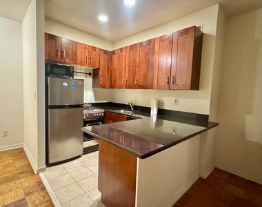 30 Christopher Street - Photo Thumbnail 1