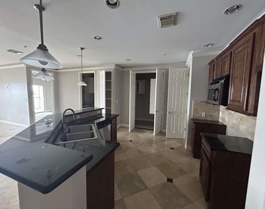 7039 Kingston Cove Lane - Photo Thumbnail 7