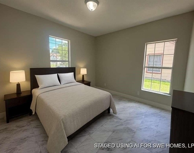 7410 Dallas Street - Photo Thumbnail 7