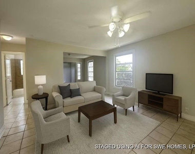 7410 Dallas Street - Photo Thumbnail 3