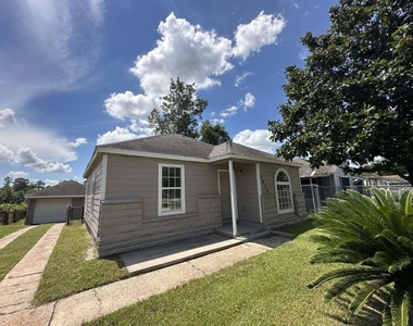 7410 Dallas Street - Photo Thumbnail 1
