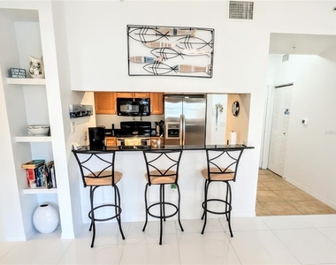 1064 N Tamiami Trail - Photo Thumbnail 5