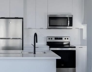 215 East 124th Street - Photo Thumbnail 2