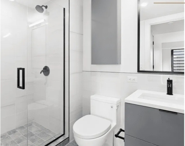 215 East 124th Street - Photo Thumbnail 3